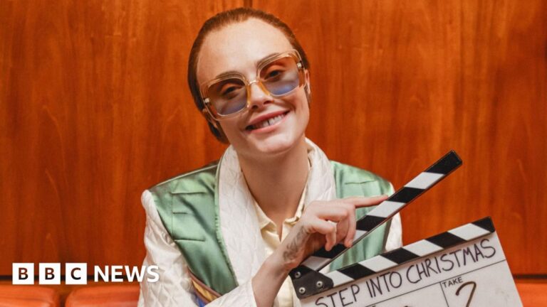 Read more about the article Cara Delevingne plays Elton John in Step Into Christmas video remake