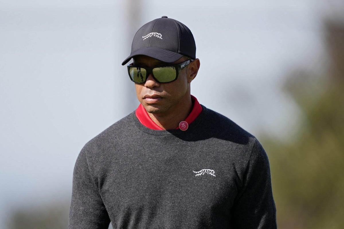 You are currently viewing Tiger Woods says he’s recovering after surgery to repair a ruptured Achilles