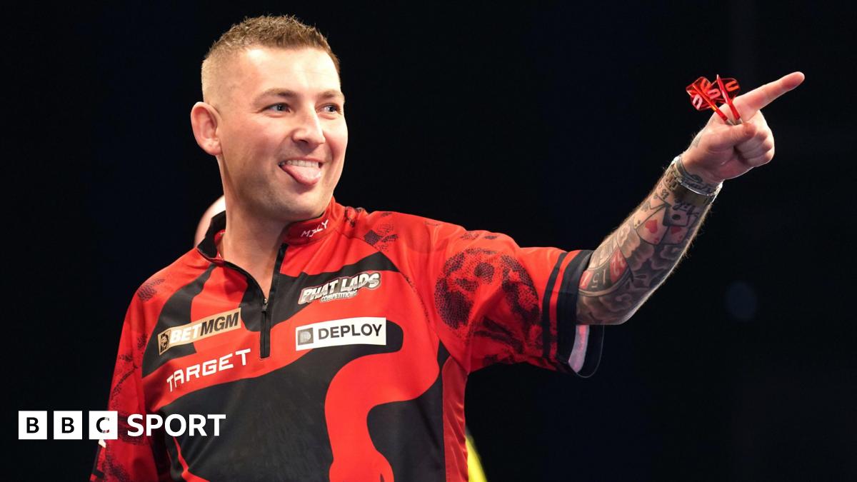You are currently viewing Premier League Darts results: Nathan Aspinall claims first nightly win in Manchester